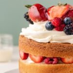 Homemade berry chantilly cake recipe result: vanilla layers with chantilly cream, strawberries, blueberries, raspberries and blackberries